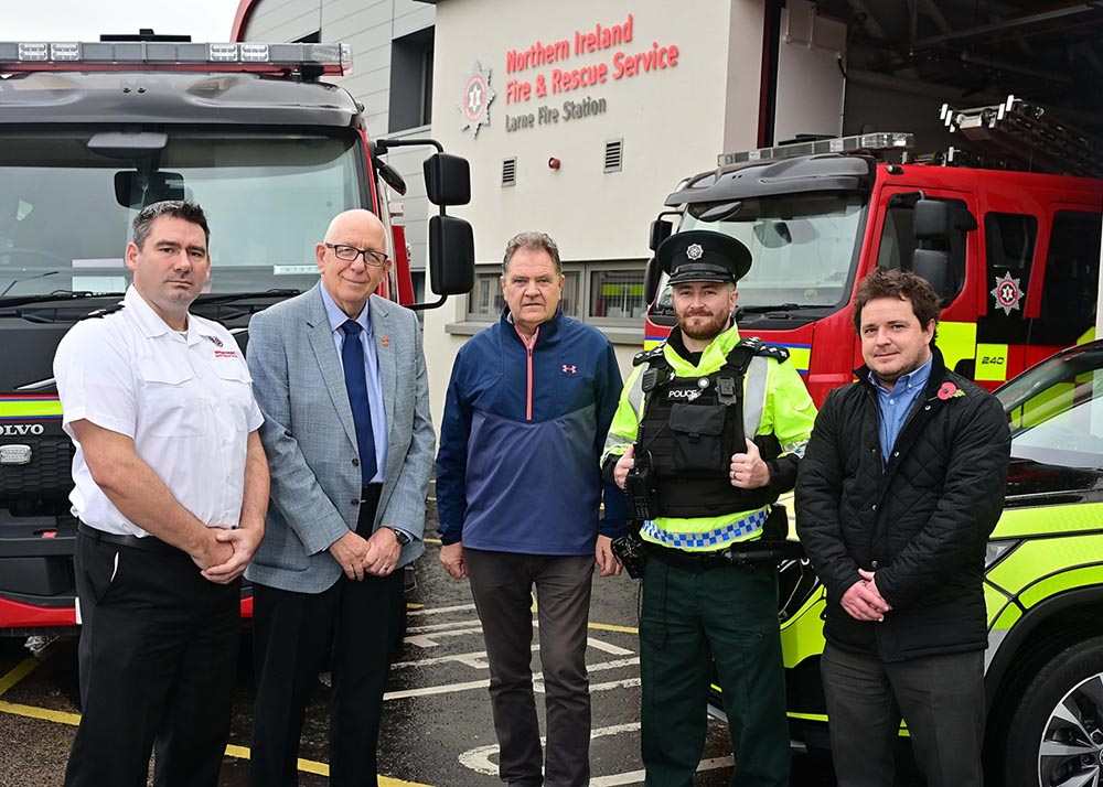 Photo Caption outside station: (L-R): NIFRS - Station Commander Rick Allen PCSP Chair - Cllr Jackson Minford PCSP Vice Chair – Noel Rogan PSNI - Chief Inspector Adrian Bryan  Acting Community Planning & Development Manager Neil Herron